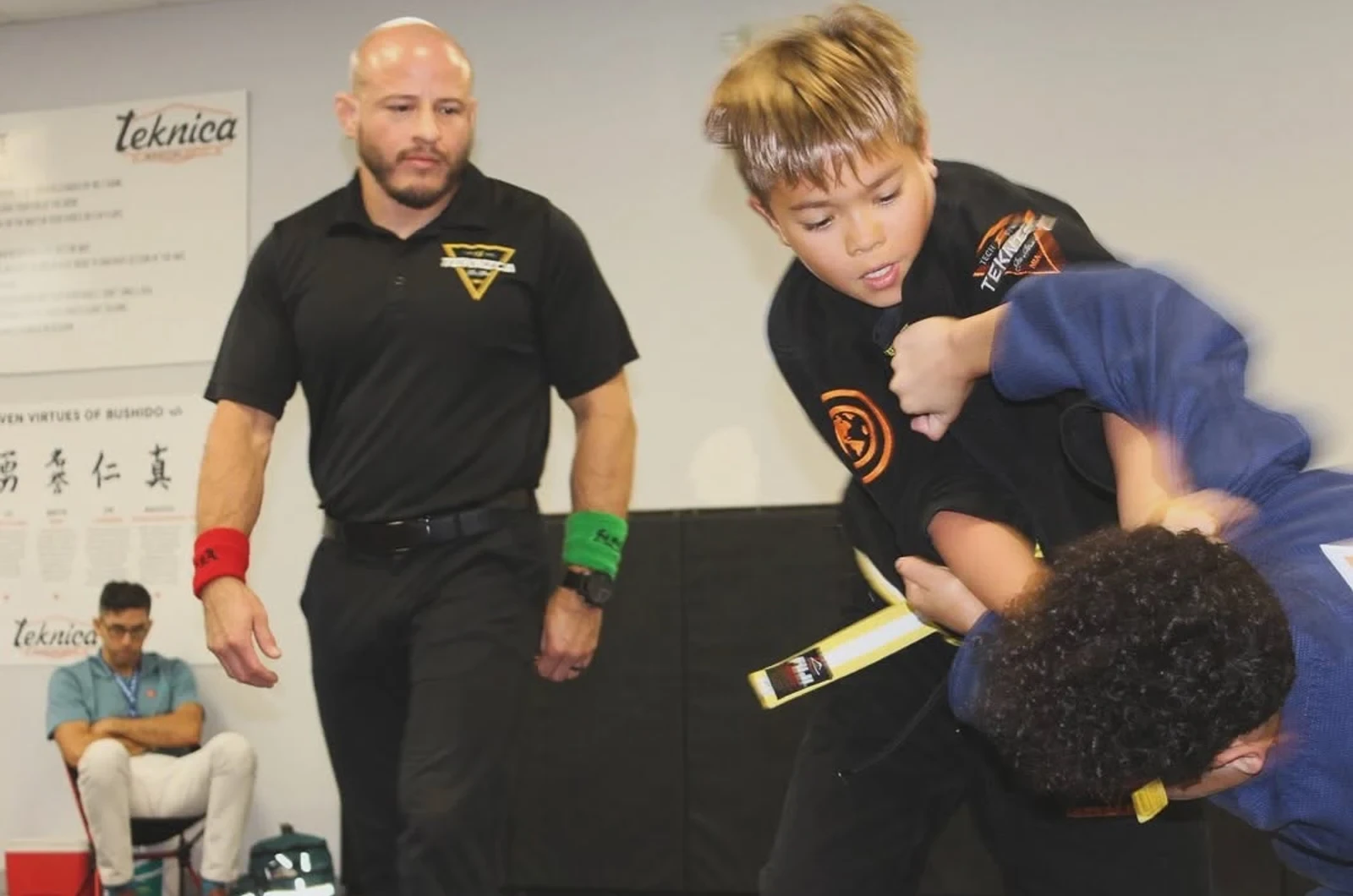 Child building confidence in martial arts
